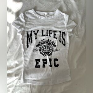 White top short sleeve with black writing